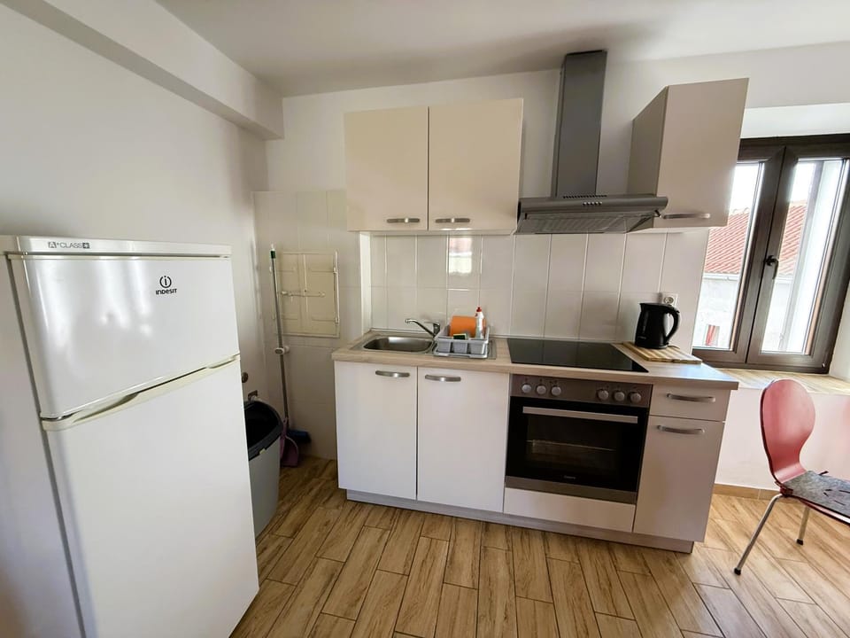 Kitchen or kitchenette, stove