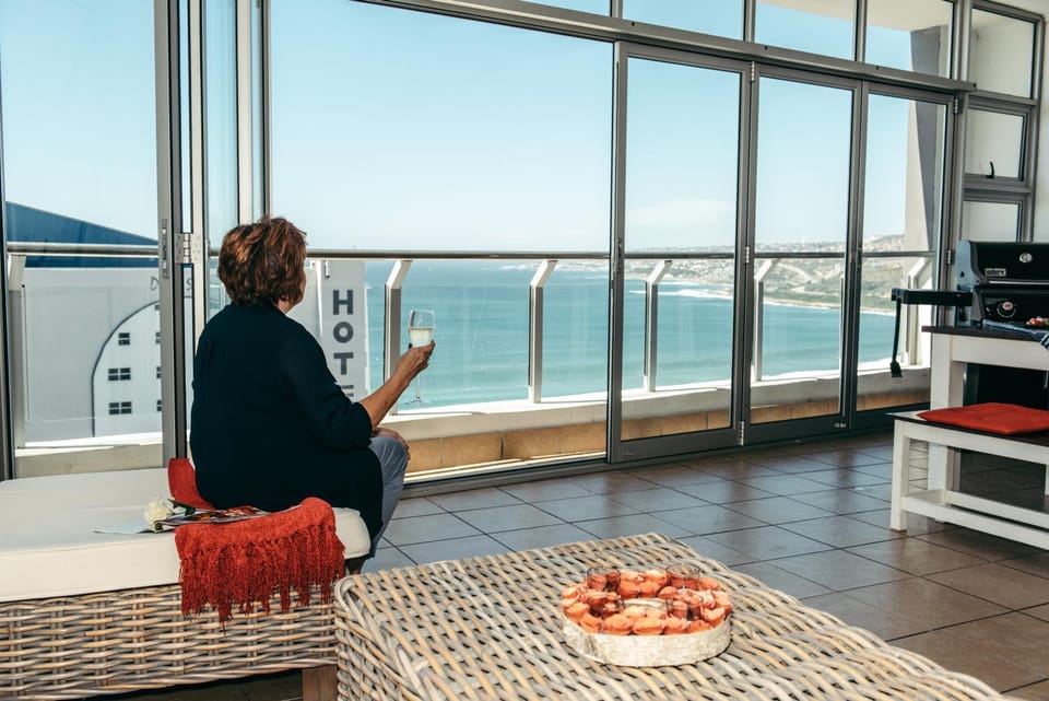 People, Natural landscape, View (from property/room), Balcony/Terrace, Balcony/Terrace, Living room, Food and drinks, Seating area, Dining area, Food, Sea view, group of guests