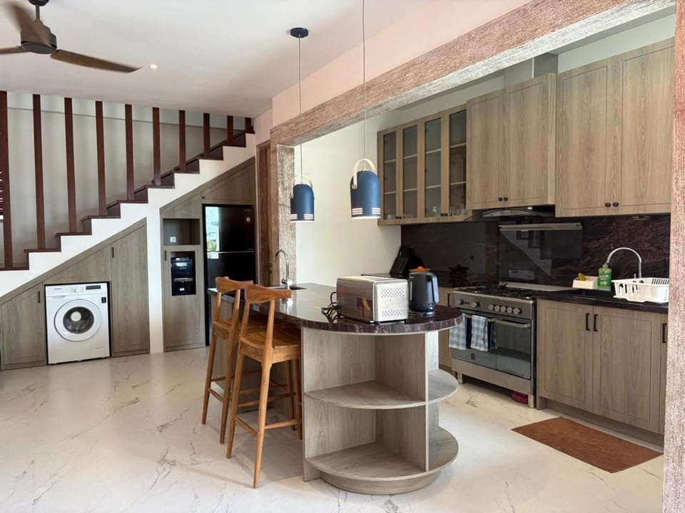 Kitchen or kitchenette, dishwasher, oven, stove, washing machine, kitchen