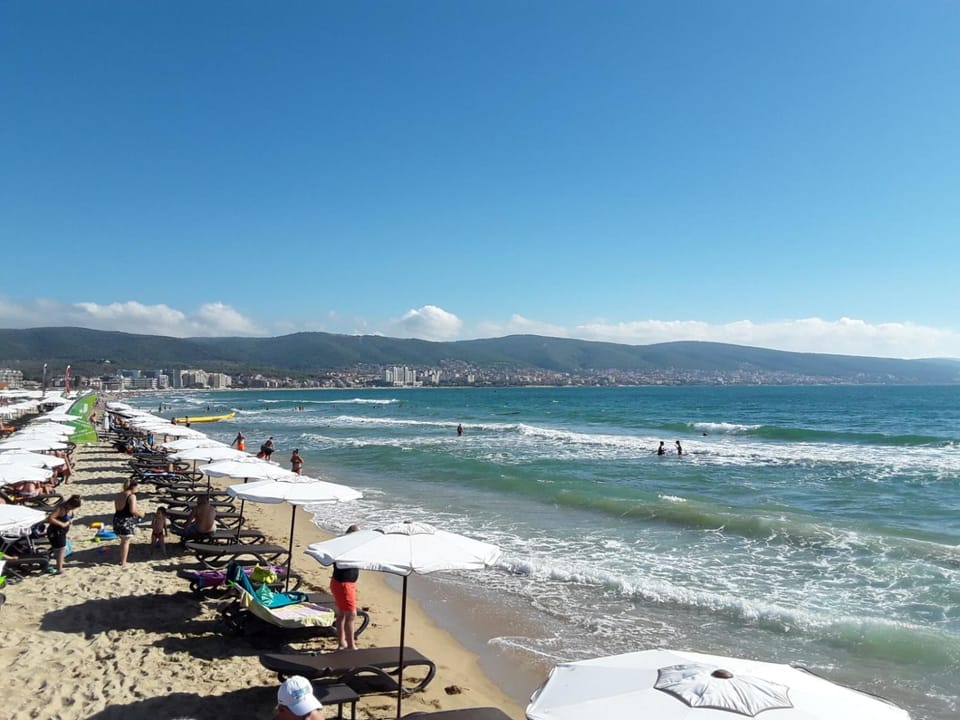 Nearby landmark, Day, People, Natural landscape, Beach, Mountain view, Sea view, group of guests, sunbed