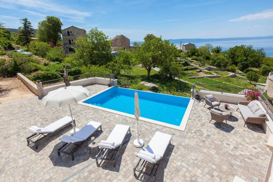 Seating area, Sea view, Swimming pool
