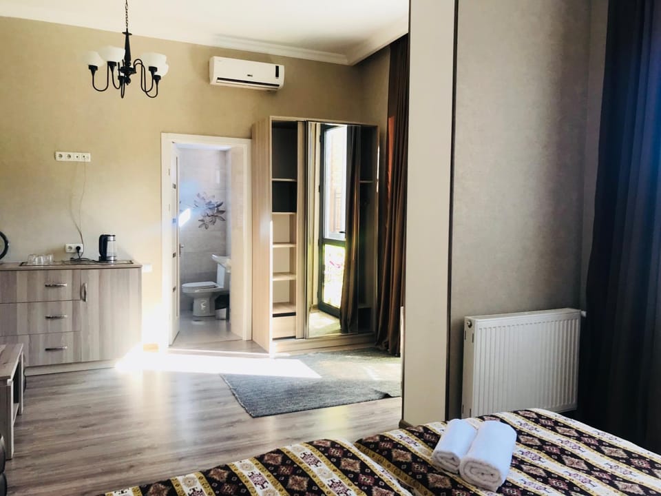 Shower, Bathroom, Seating area, Bedroom