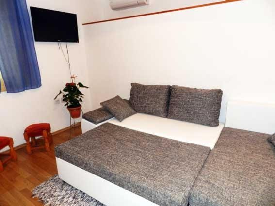 Bed, Living room, Seating area, Bedroom