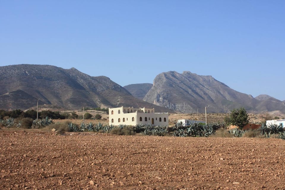 Property building, Nearby landmark, Day, Natural landscape, Mountain view