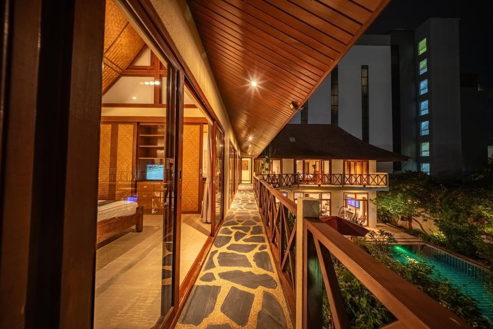 Property building, Patio, Night, Pool view, Swimming pool