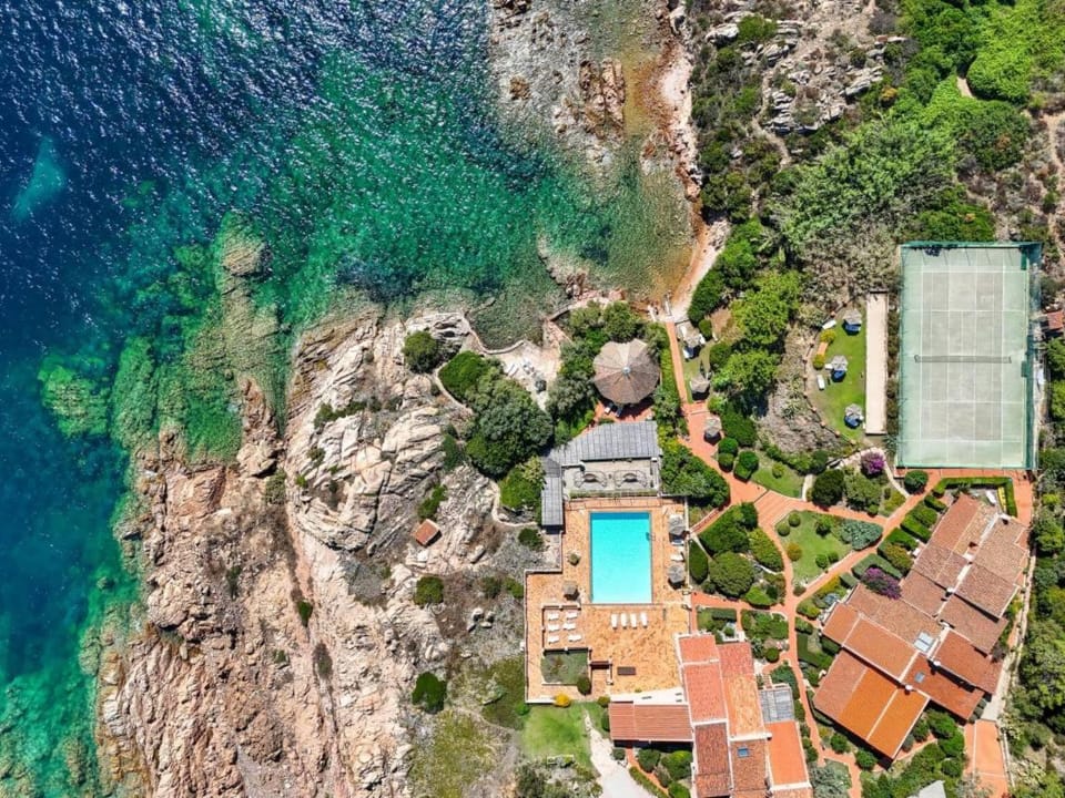 CASA MUGHETTO R5055 WiFi, seafront, private sea access, swimming pool House in Sardinia