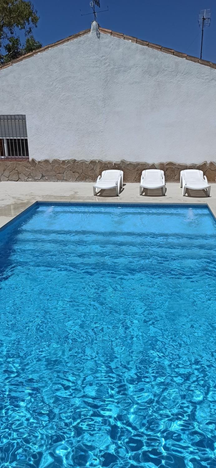 Property building, Living room, Swimming pool
