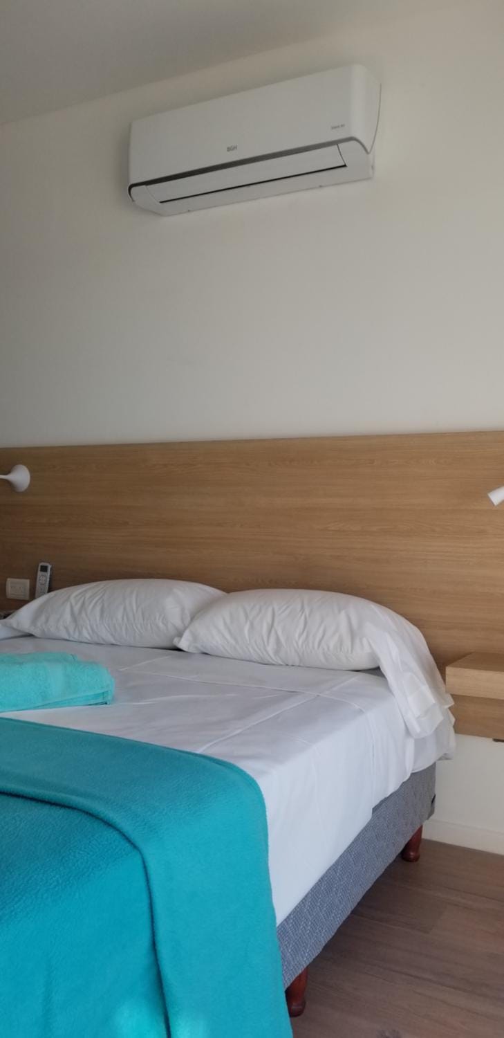 Bed, air conditioner