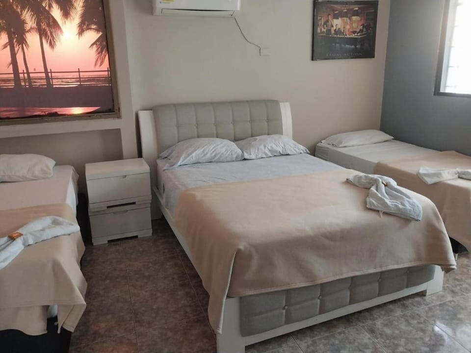 Bed, Photo of the whole room, Bedroom, towels, air conditioner