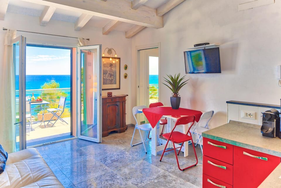 Kitchen or kitchenette, Living room, Dining area, Sea view
