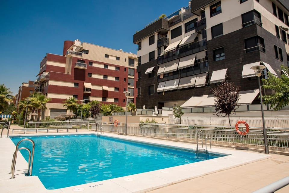 EnjoyGranada LUJO Piscina y Parking Apartment in Granada