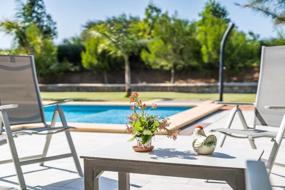 Property building, Living room, Swimming pool