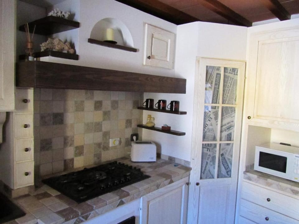 Kitchen or kitchenette, stove
