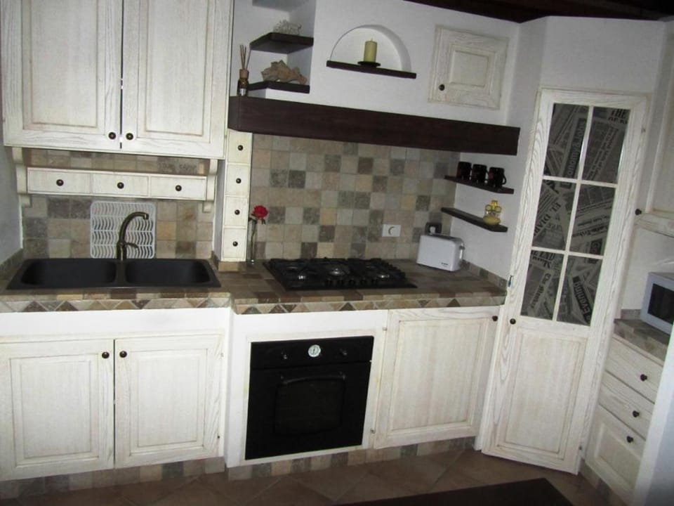 Kitchen or kitchenette, stove