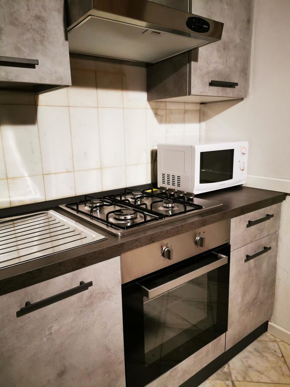 Kitchen or kitchenette, stove
