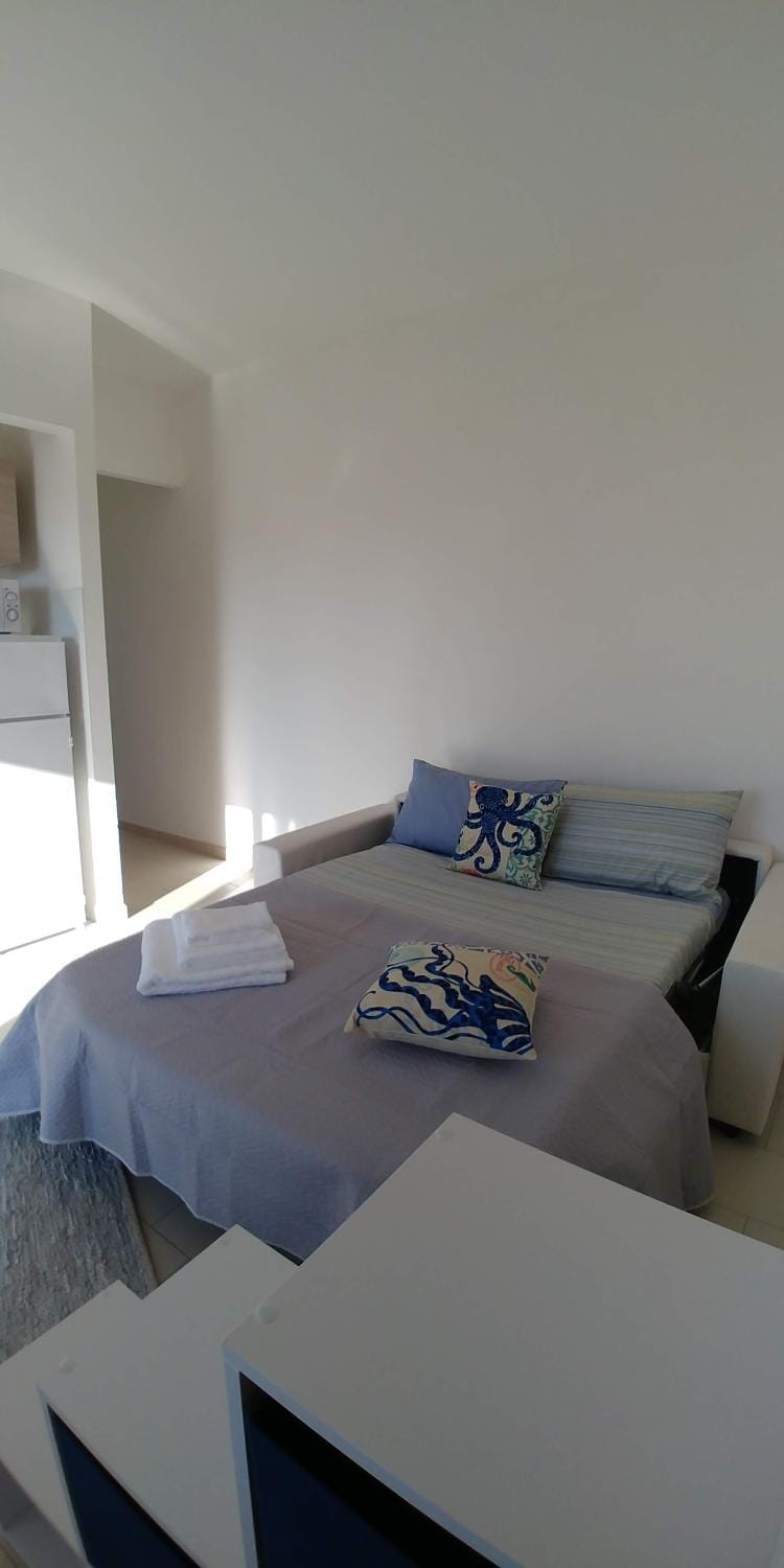 Bed, Living room, Dining area