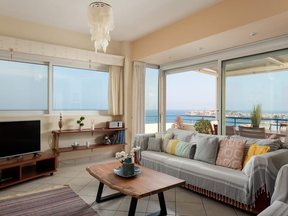 View (from property/room), Living room, Seating area, Sea view