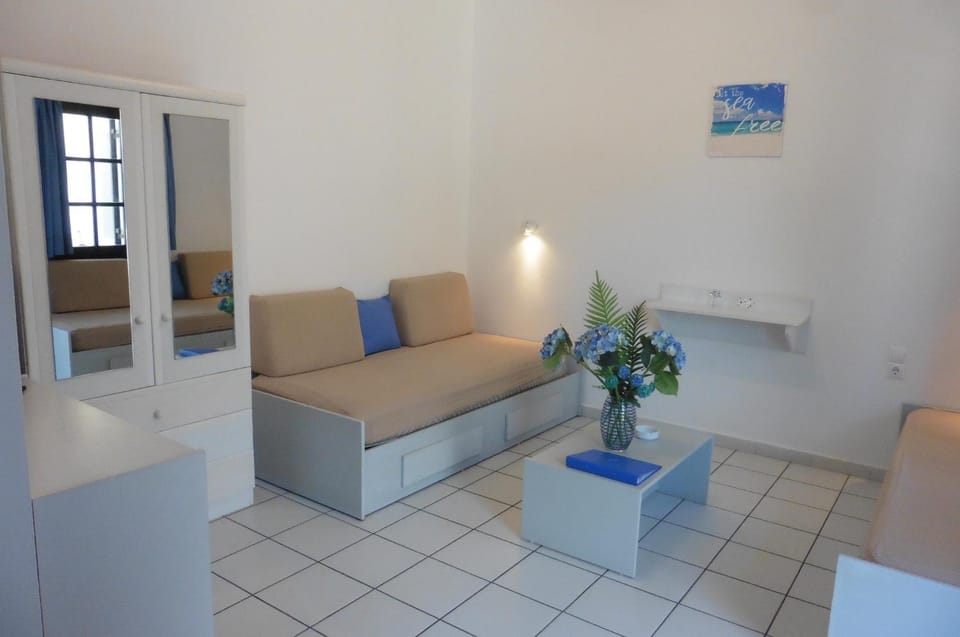 Bed, Living room, Seating area