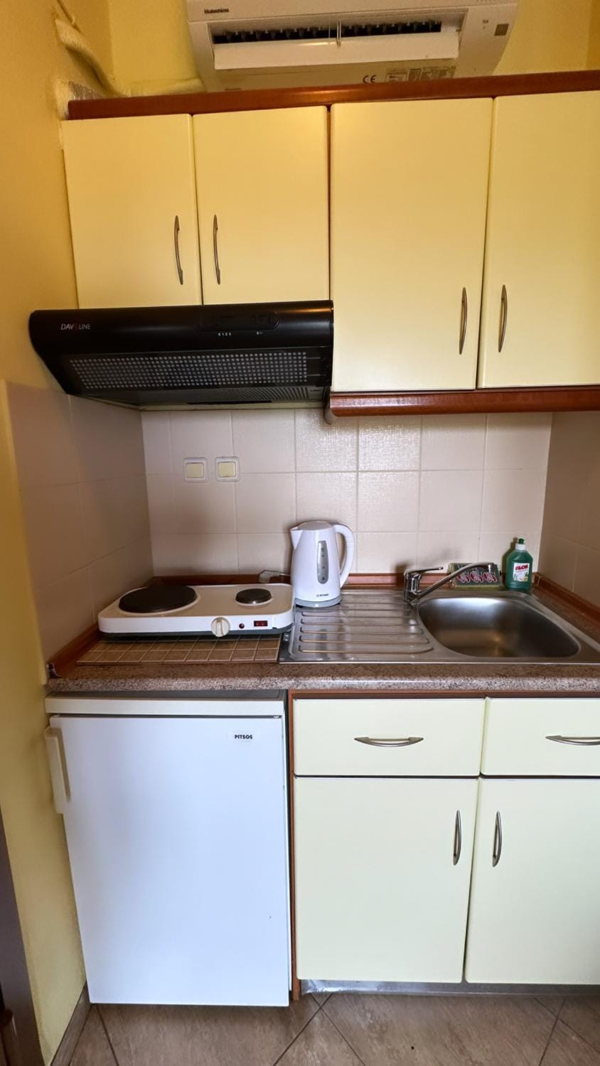 Kitchen or kitchenette, stove