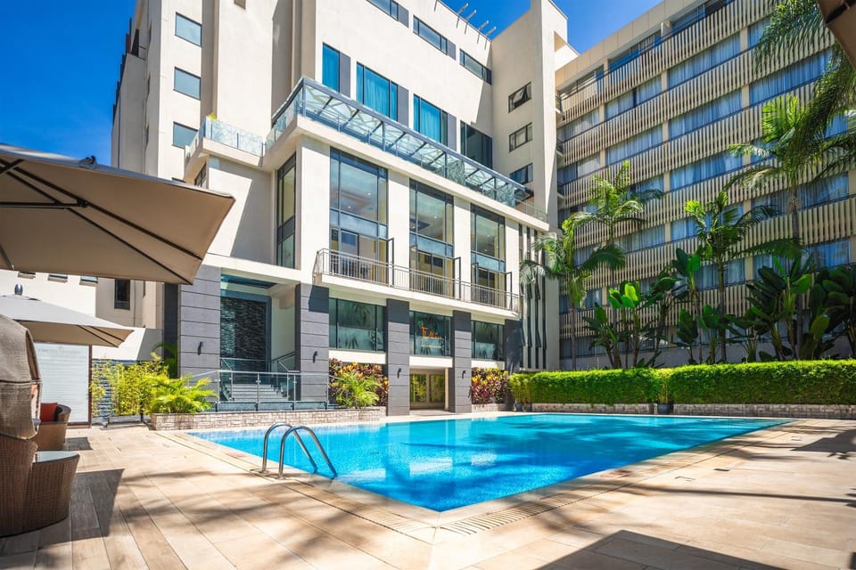 Property building, Patio, Day, Pool view, Swimming pool, Swimming pool