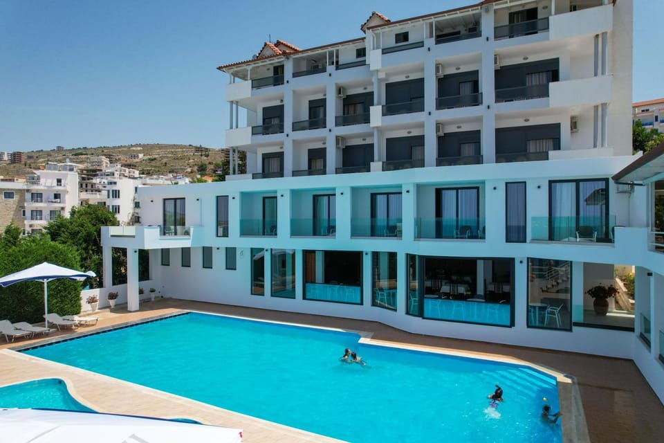 Property building, Day, Pool view, Swimming pool