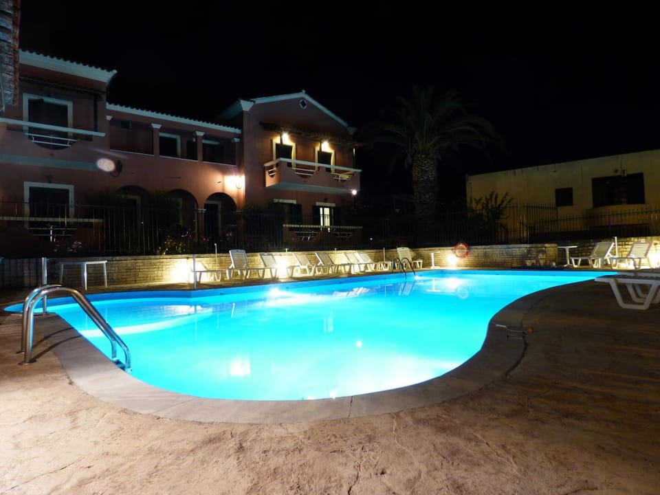 Property building, Night, Pool view, Swimming pool