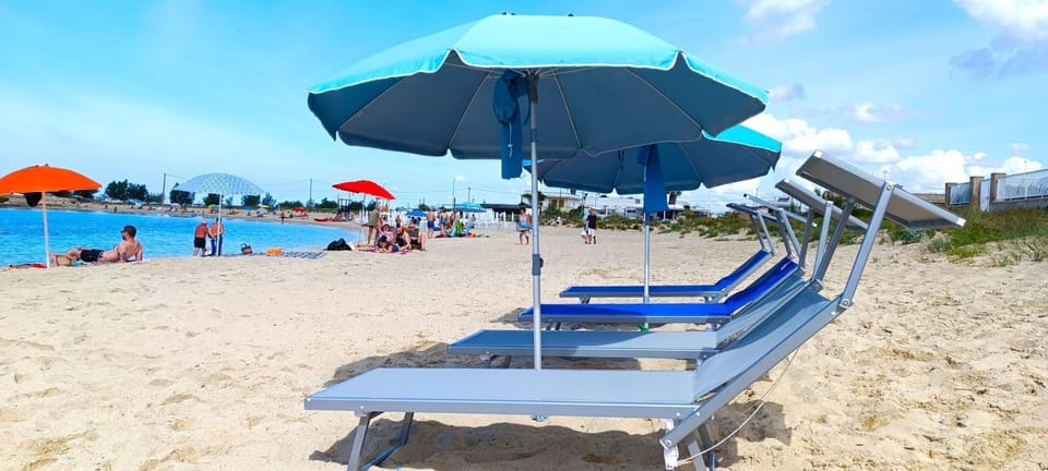Nearby landmark, Natural landscape, Beach, Beach, sunbed