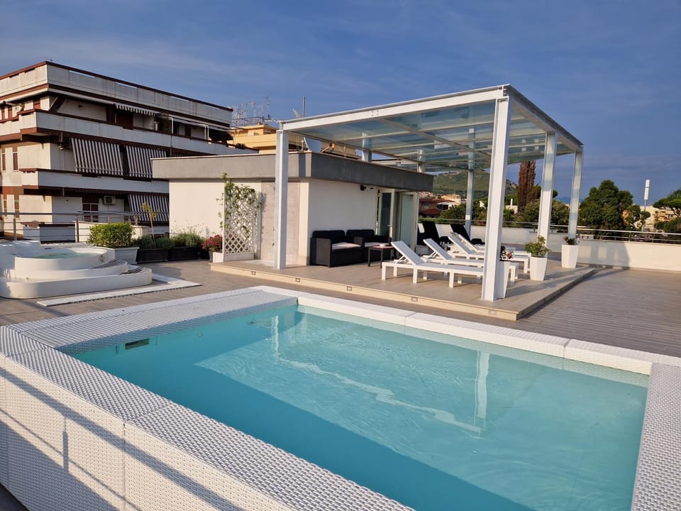 Property building, Patio, Day, Natural landscape, View (from property/room), Balcony/Terrace, Pool view, Swimming pool, sunbed