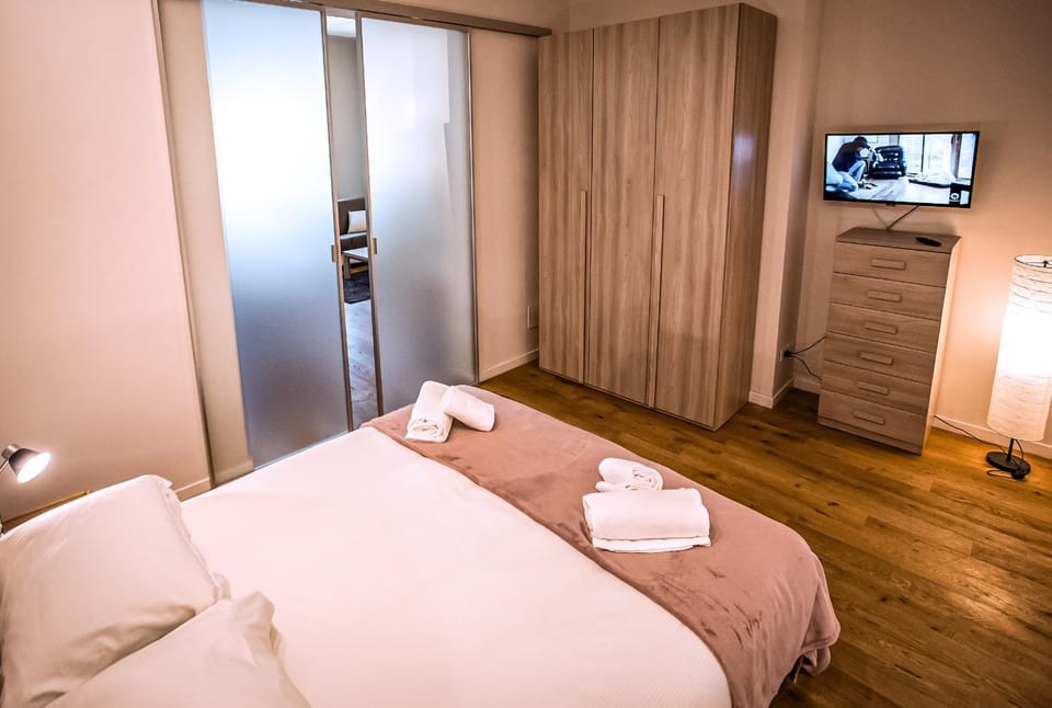 Bed, TV and multimedia, Bedroom, towels, wardrobe