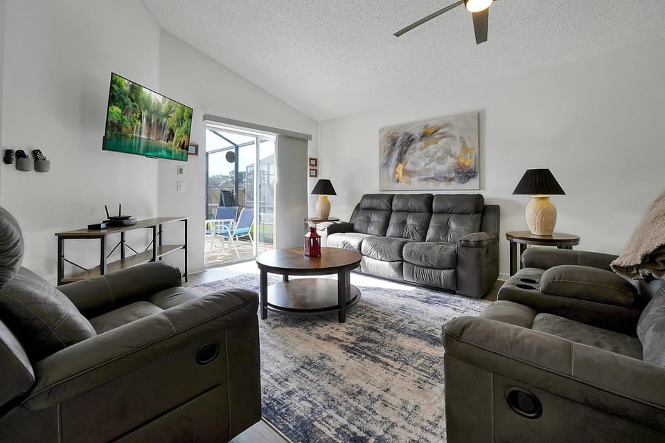 TV and multimedia, Living room, Photo of the whole room, Seating area, Pool view, fireplace