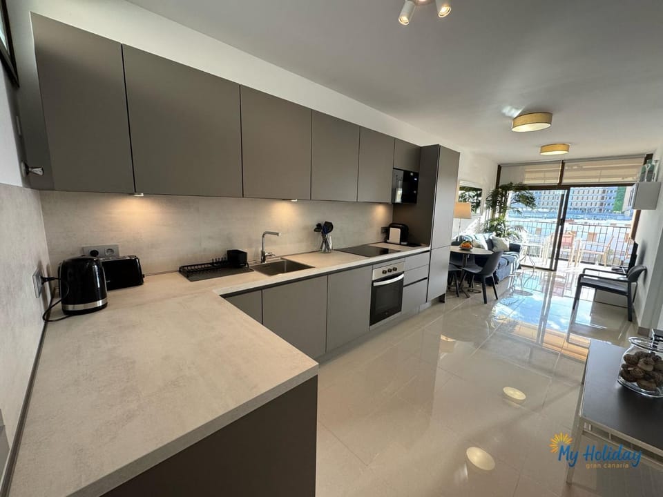 Kitchen or kitchenette, oven, stove, toaster