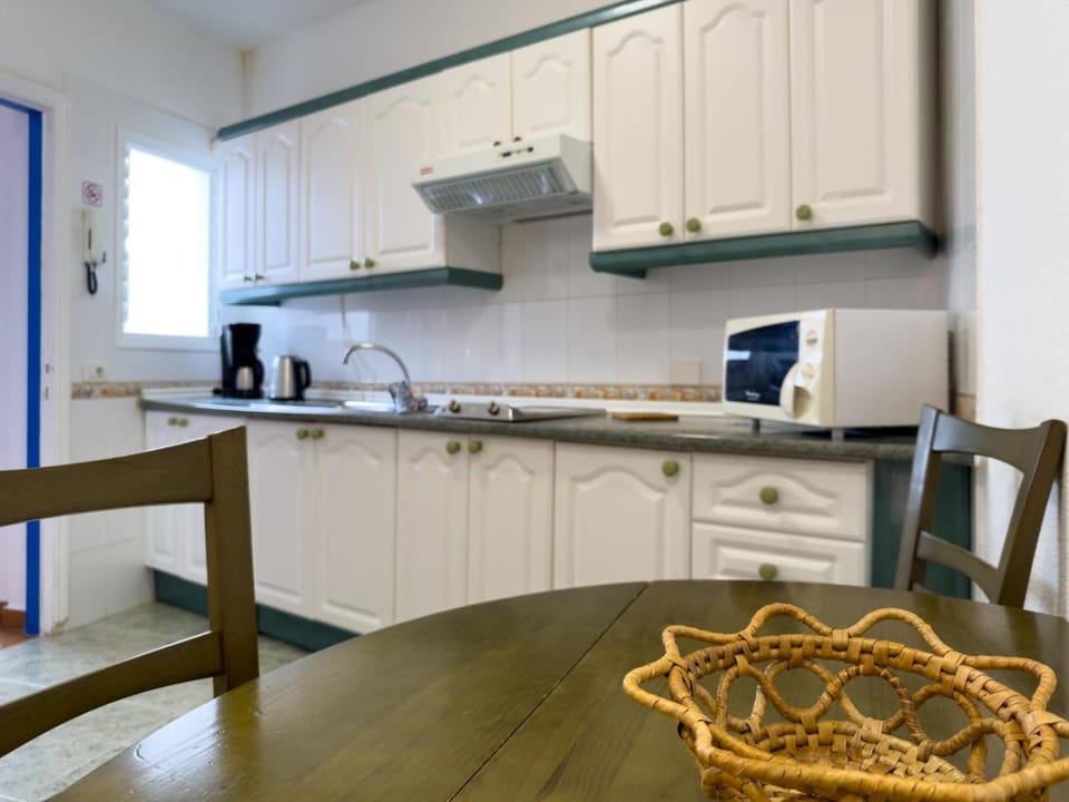 Kitchen or kitchenette, microwave