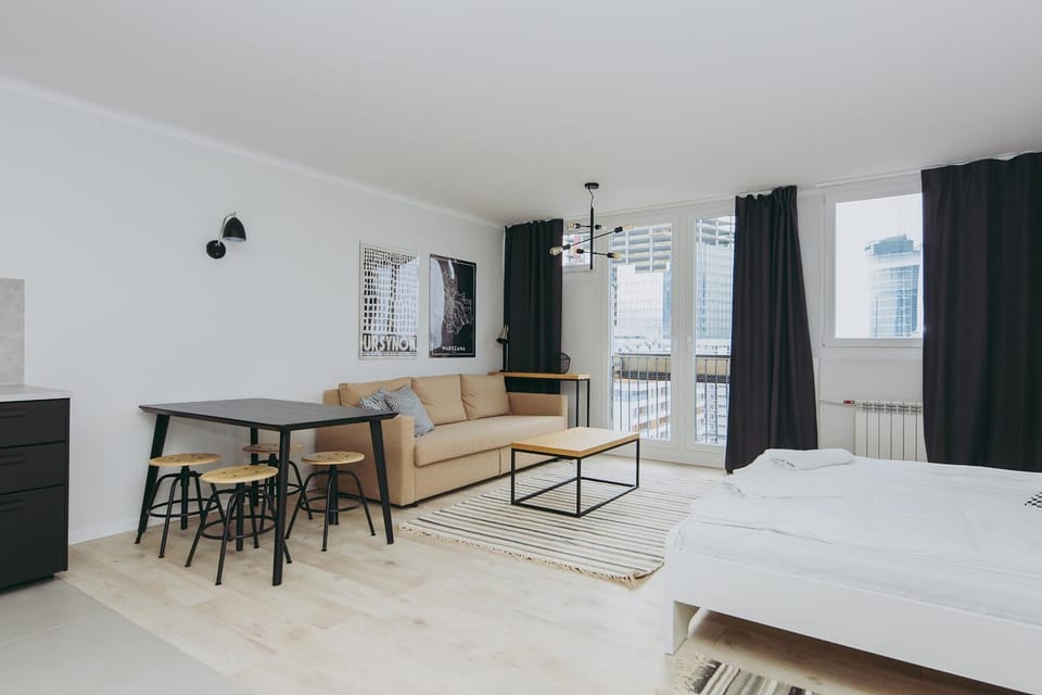 Bed, Living room, Seating area, Dining area