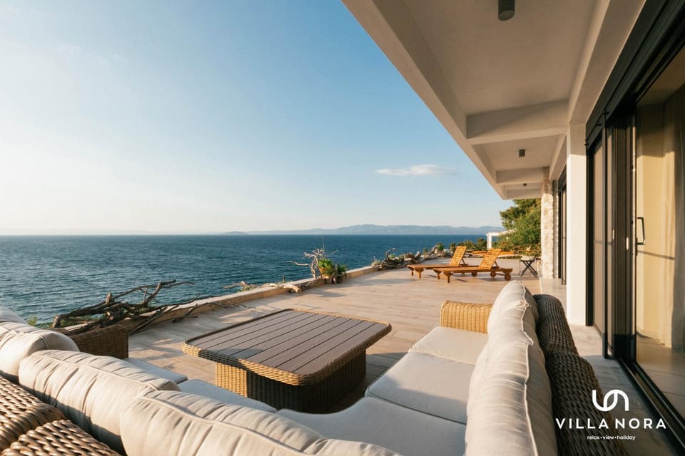 Natural landscape, View (from property/room), Seating area, Sea view, sunbed