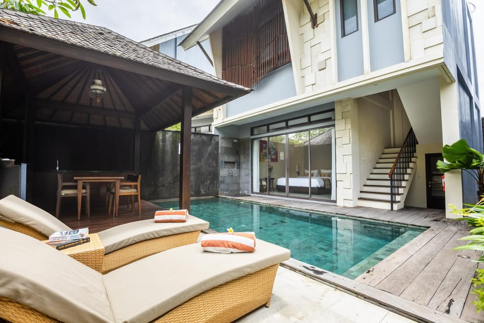 Property building, Seating area, Pool view, Swimming pool, sunbed