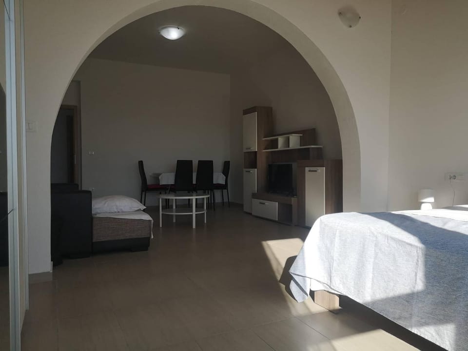 Bed, Living room, Seating area, Bedroom