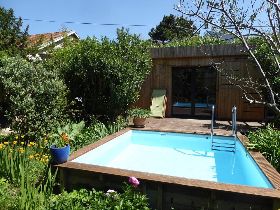Property building, Patio, Garden, Pool view, Swimming pool, sunbed