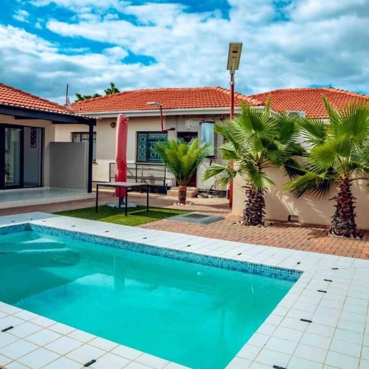 Cycad Palm Guest House Palapye. Bed and Breakfast in Africa