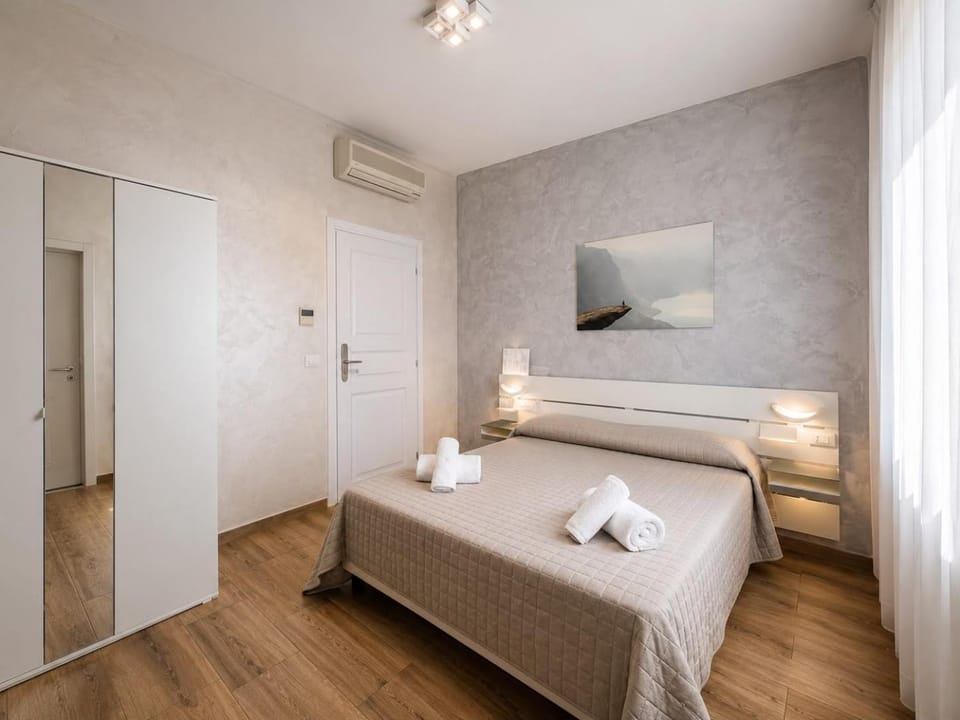 Bed, Bedroom, towels, wardrobe, air conditioner