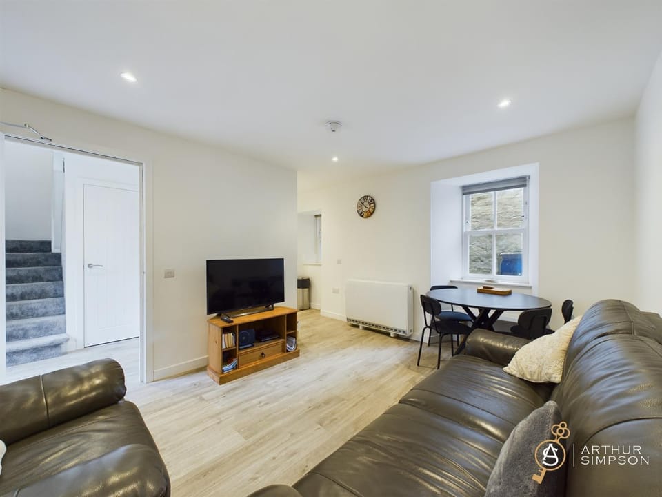 Modern Commercial Street Maisonette Apartment in Scotland