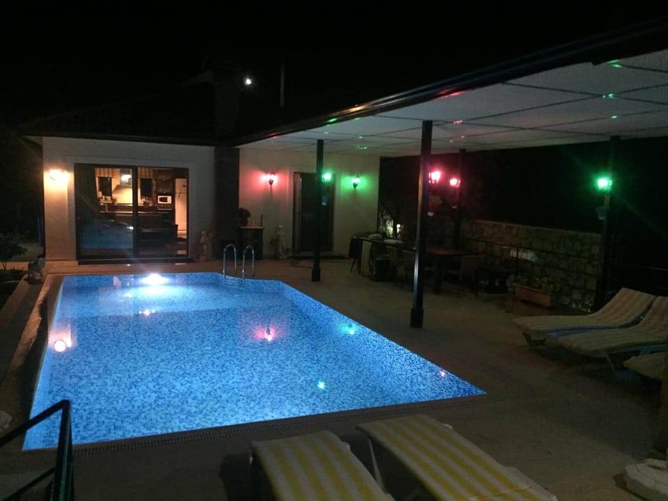 Night, Pool view, Swimming pool, sunbed