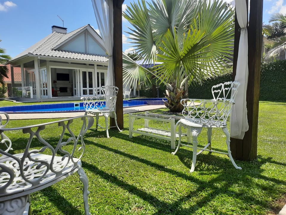 Property building, Patio, Garden, Swimming pool