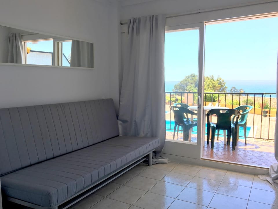 Living room, Bedroom, Pool view, Sea view