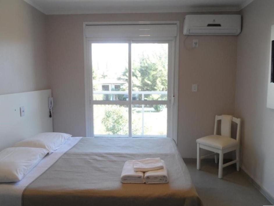 Bed, Photo of the whole room, Bedroom, towels, air conditioner