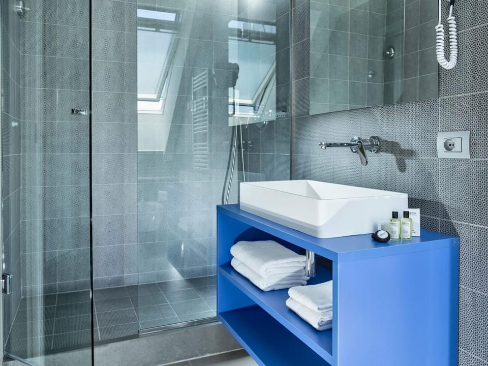 Shower, Toilet, Bathroom, bidet, hair dryier, towels