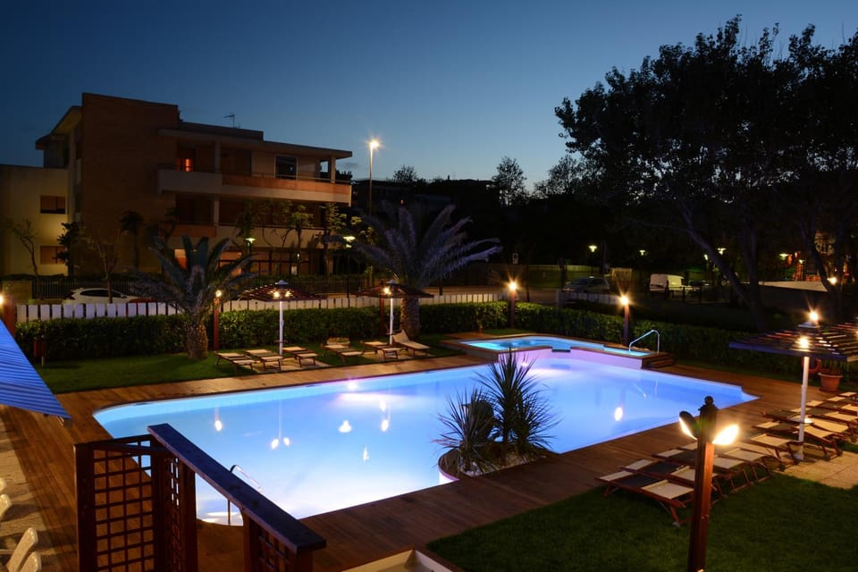Property building, Swimming pool, Sunset