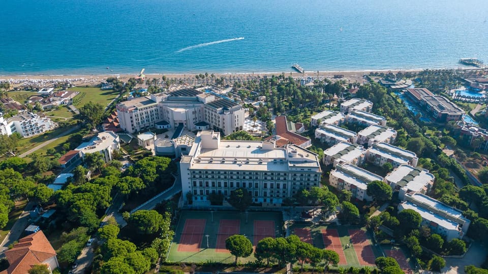 Property building, Natural landscape, Bird's eye view, Beach, Sea view