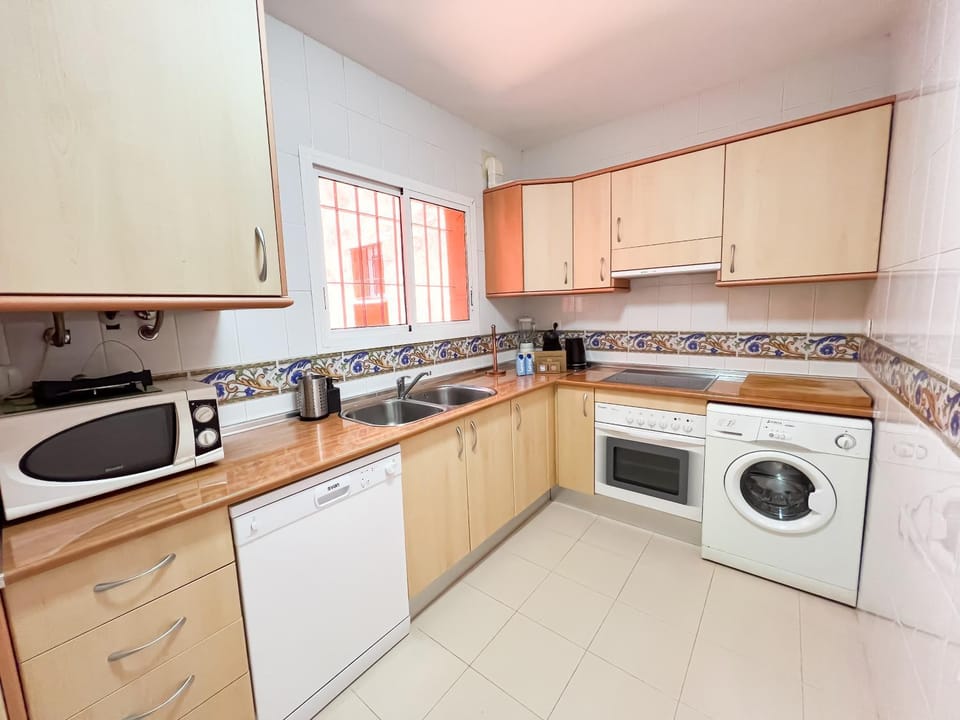 Kitchen or kitchenette, dishwasher, oven, pet friendly, stove, toaster, washing machine