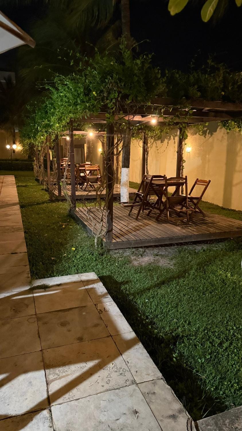 Property building, Patio, Night, Garden, Garden, Solarium, Garden view, Pool view, Swimming pool