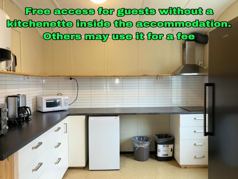 Coffee/tea facilities, Kitchen or kitchenette, Text overlay, minibar, stove, toaster